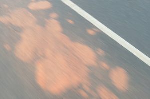 Ceceran Tanah Depan Hotel Aston Dikeluhkan Warga, Diduga Berasal Dari Proyek Pembuatan DAM