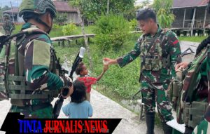 Dukung Program Presiden Prabowo, Satgas Yonif 642/Kps Beri Makan Bergizi Gratis untuk Anak-Anak Kamundan